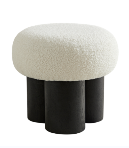Cream boucle ottoman with three dark wood legs ideal for modern living rooms