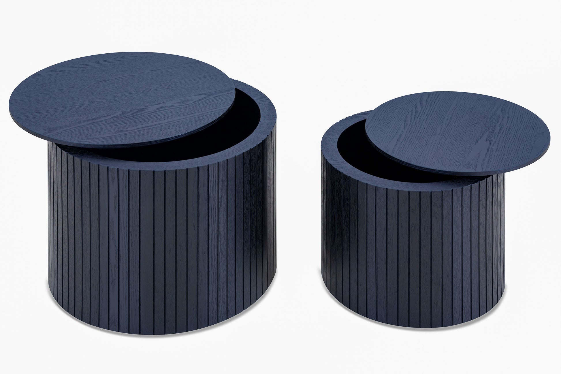 Two dark blue ribbed accent tables one taller than the other with removable round tops