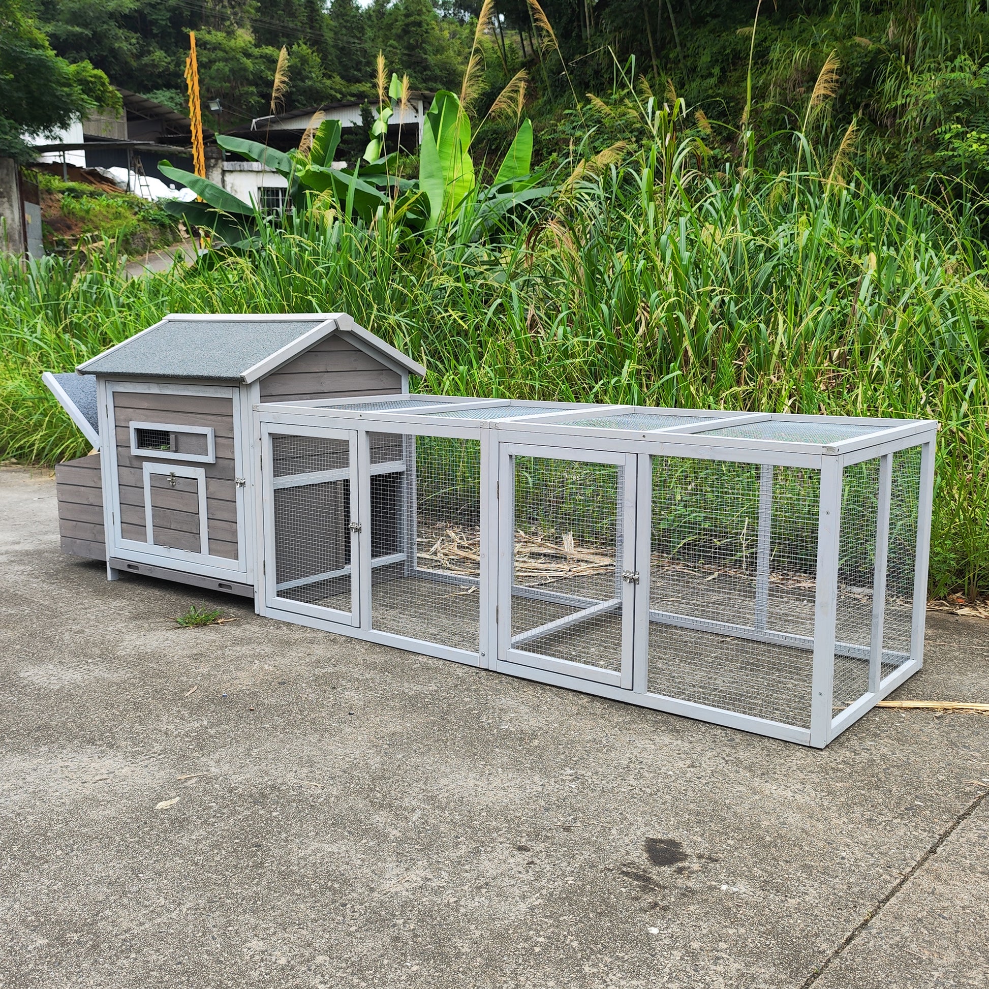 Wooden chicken coop with nesting box and large wire mesh run