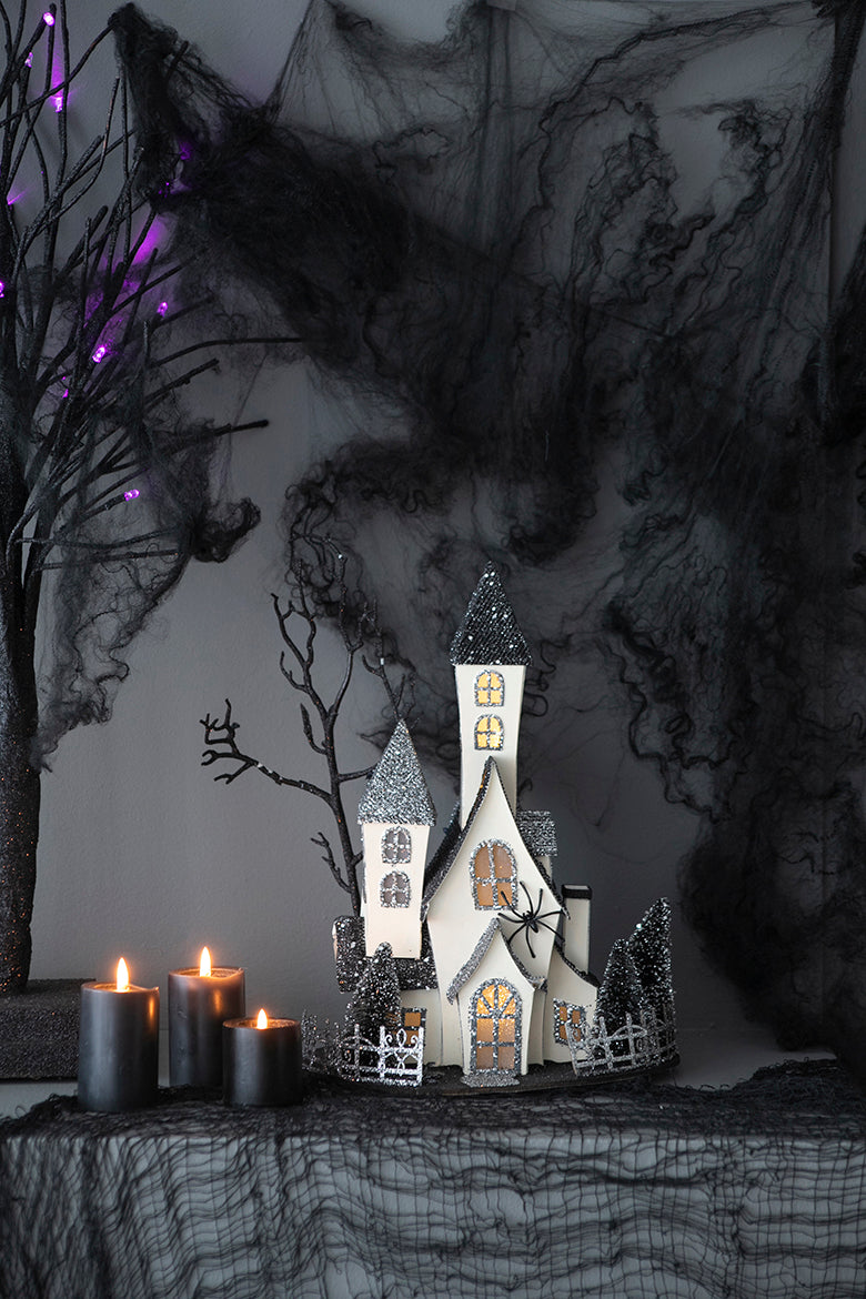 Glittering haunted house decoration with spider perfect for Halloween decor