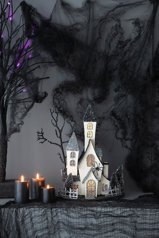 Glittering haunted house decoration with spider perfect for Halloween decor