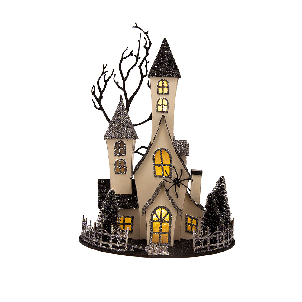 Glittering haunted house decoration with spooky silhouette trees and black spider accent