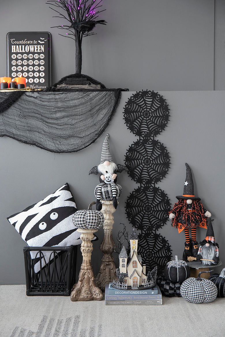 Halloween countdown sign with candles and spooky tree