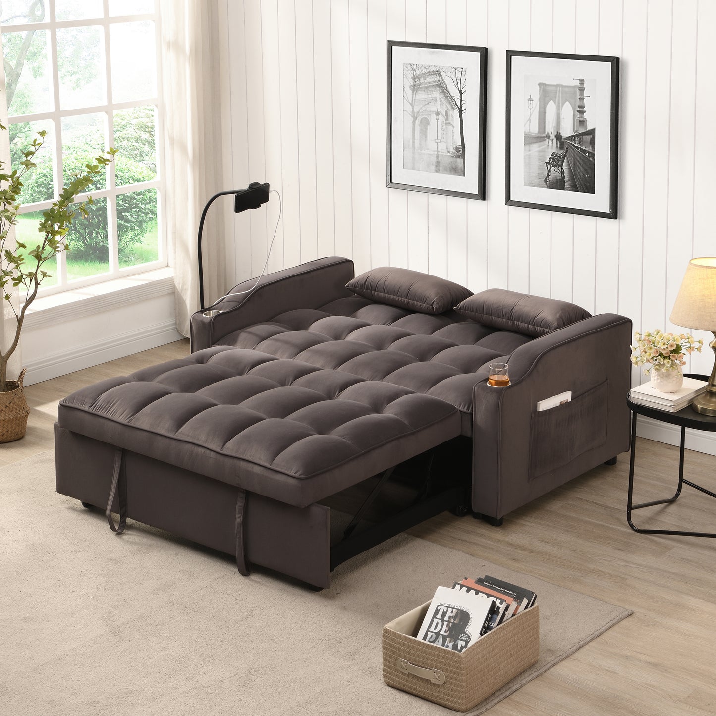 Dark gray velvet sofa bed with tufted cushions and side storage pockets