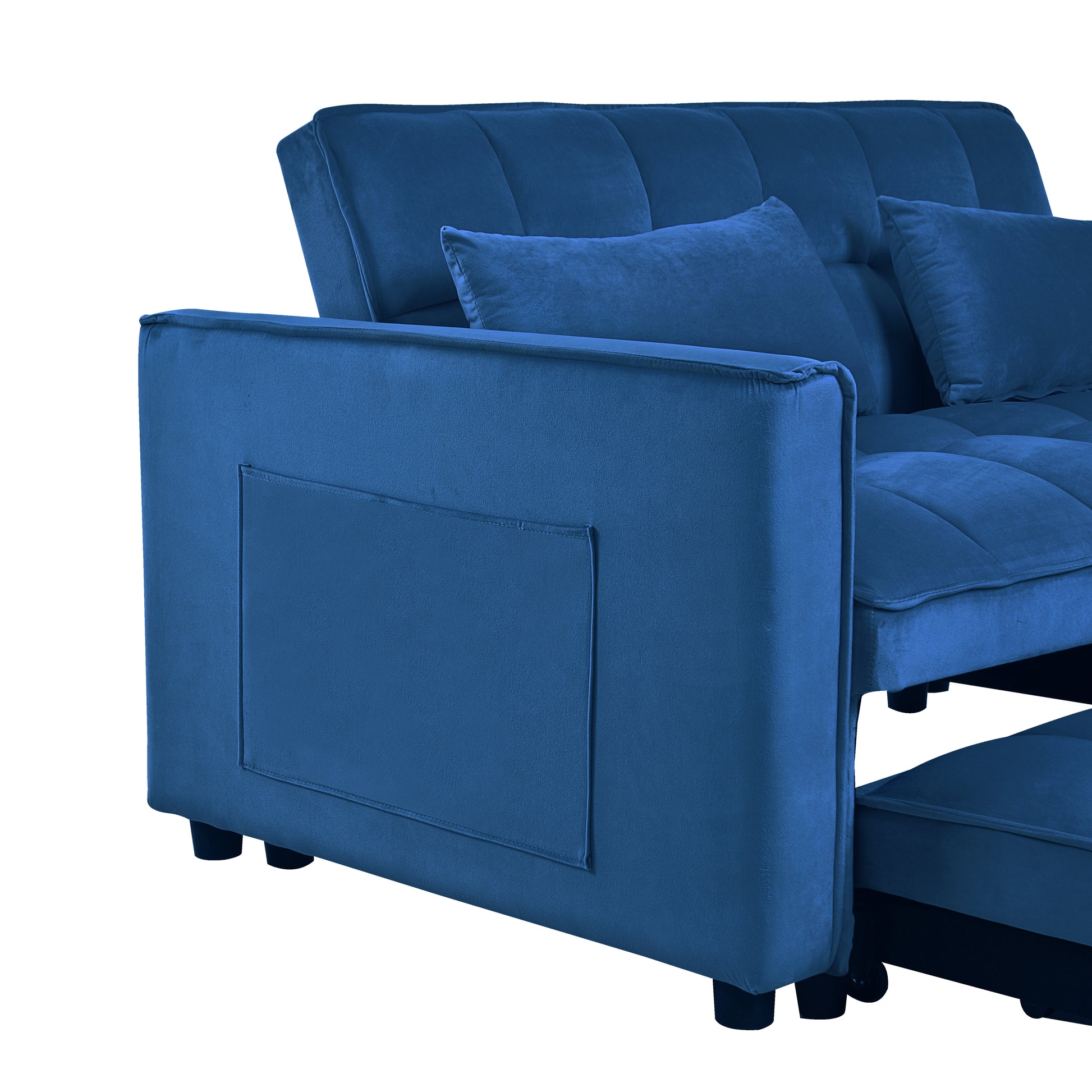 Deep blue velvet sofa with tufted back cushions and included throw pillows