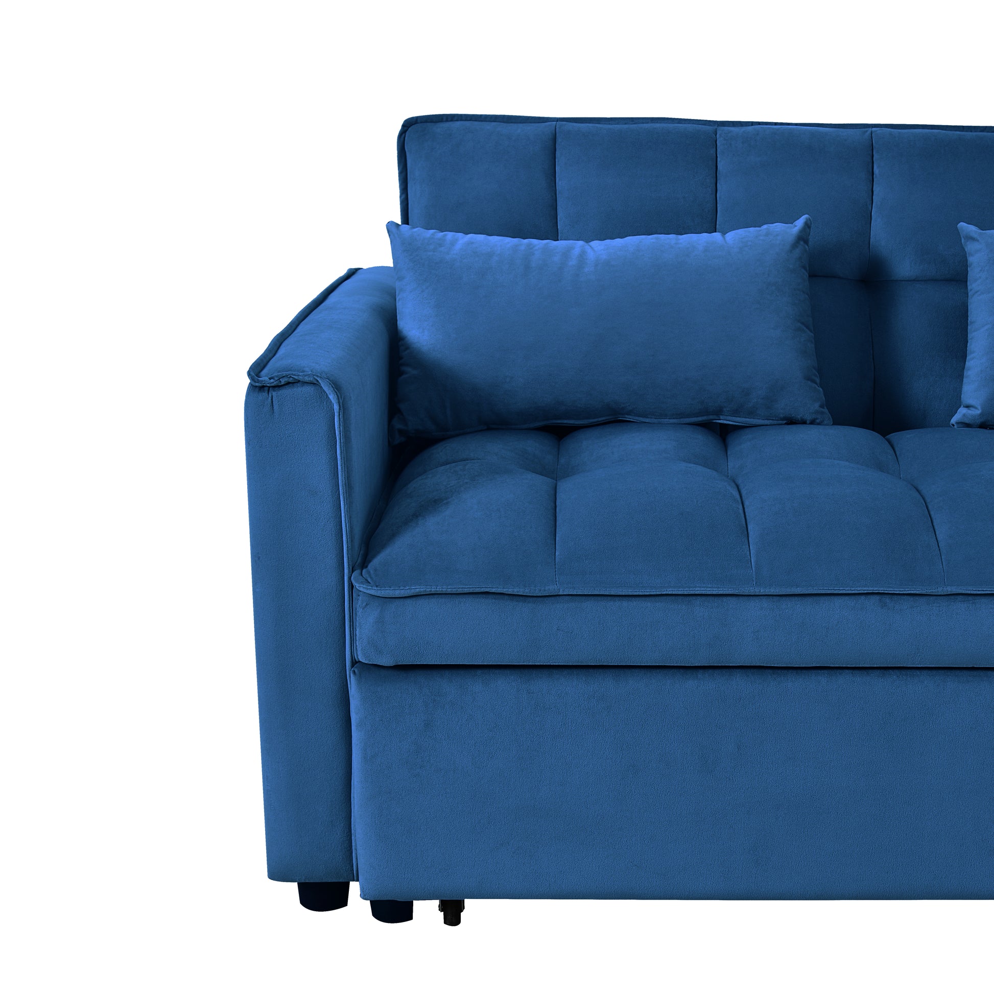 Deep blue velvet sofa with tufted cushions and two accent pillows