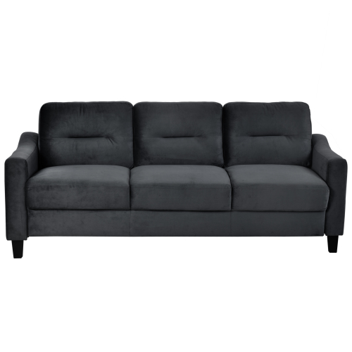 Dark grey velvet sofa with three plush seat cushions and tufted backrests