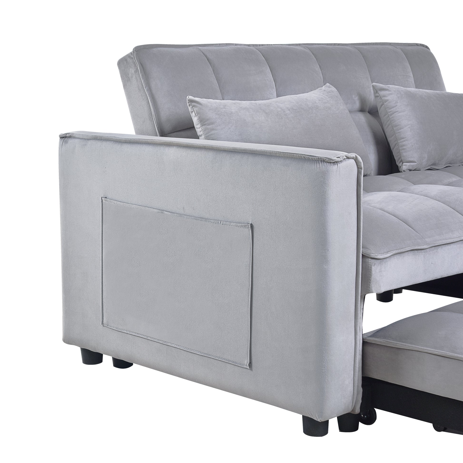 Light grey velvet sofa with tufted back and side pocket storage