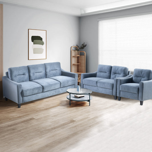 Plush blue velvet threeseater sofa with tufted back cushions for modern living rooms