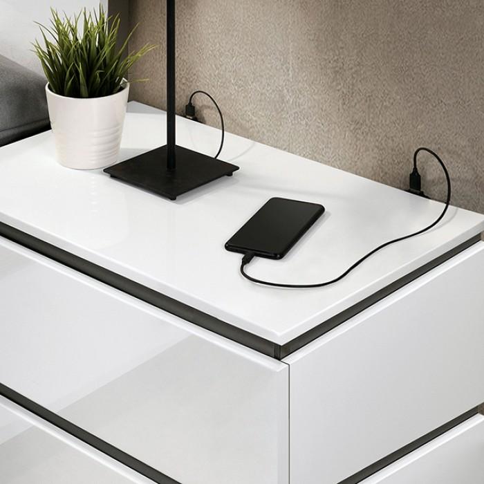 Sleek white bedside table with charging smartphone and modern lamp