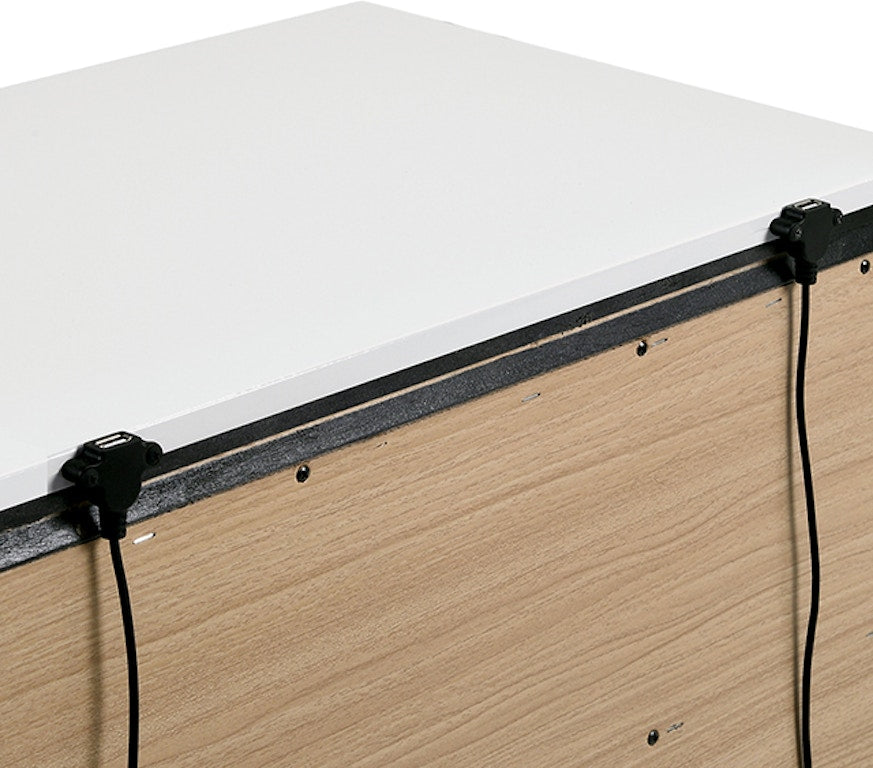 Integrated USB port on white and wood desk side