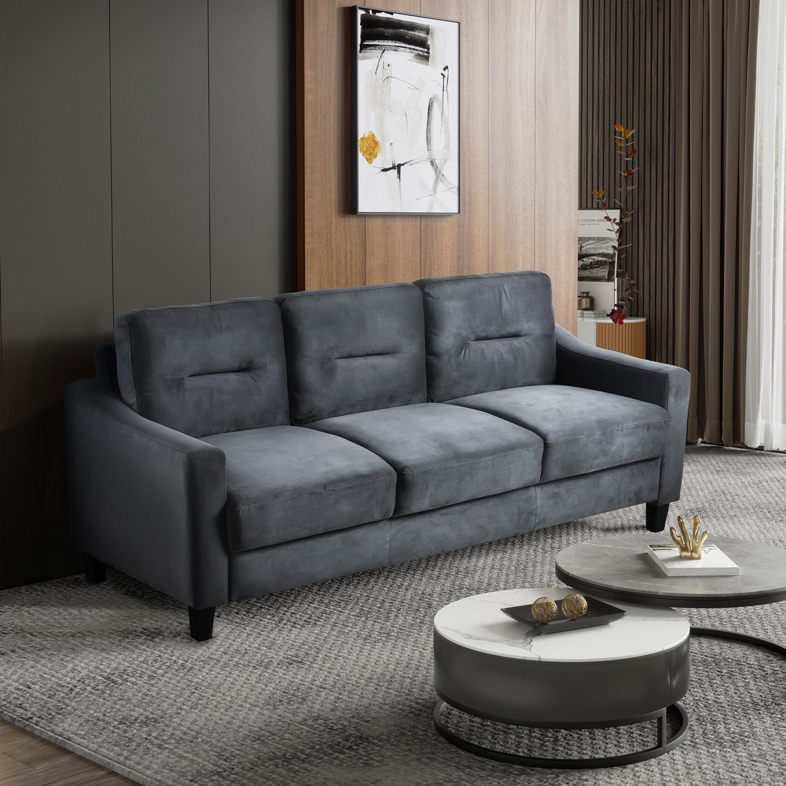 Dark gray velvet threeseater sofa with tufted back cushions for modern living rooms