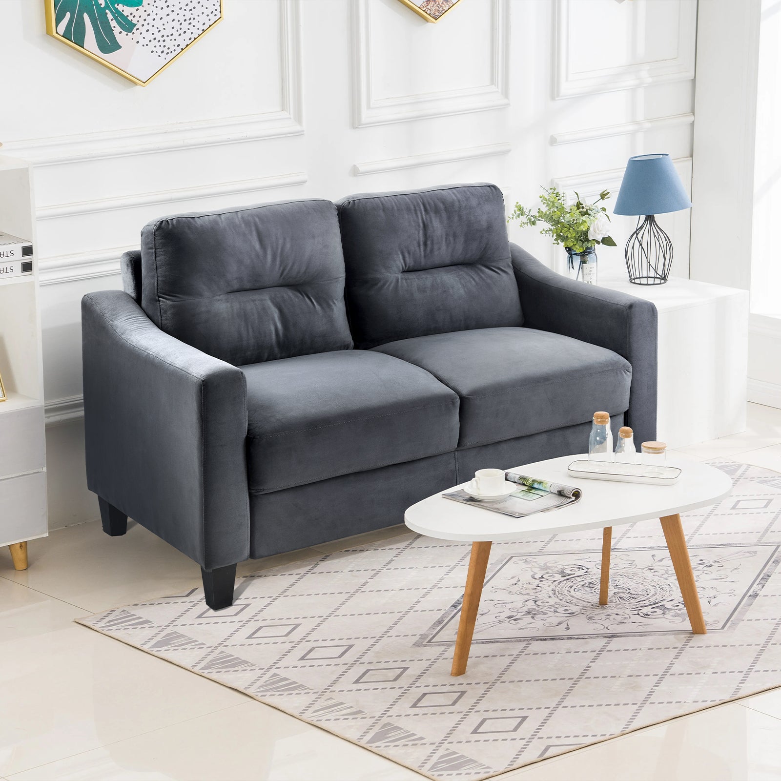 Plush grey velvet loveseat sofa with tufted back cushions for modern living room comfort