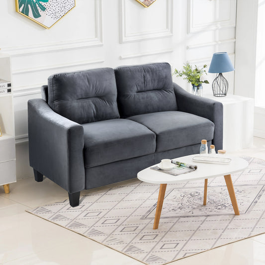 Plush grey velvet loveseat sofa with tufted back cushions for modern living room comfort