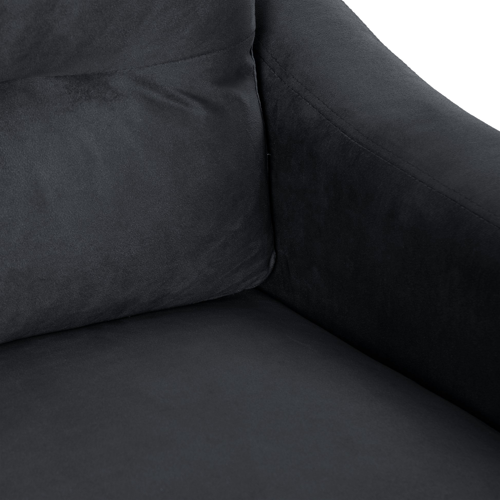Black velvet armchair cushion with detailed stitching for luxurious comfort