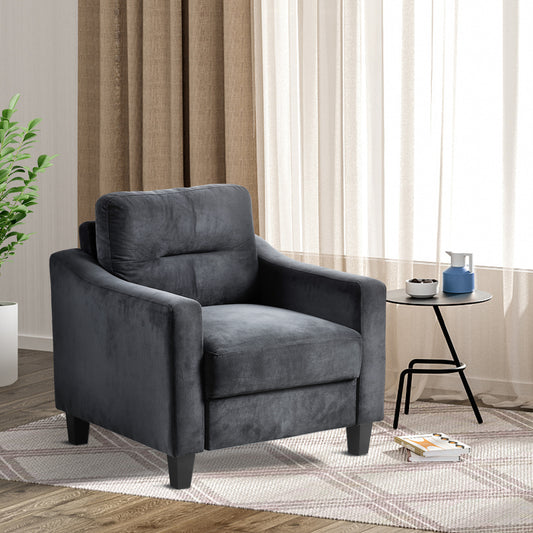 Plush charcoal velvet armchair with deep cushioning perfect for modern living rooms