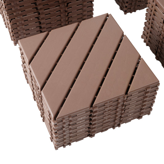 Stack of brown interlocking deck tiles with a woodgrain texture