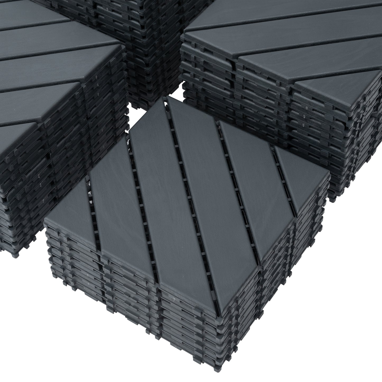 Stack of dark gray interlocking deck tiles with wood grain texture