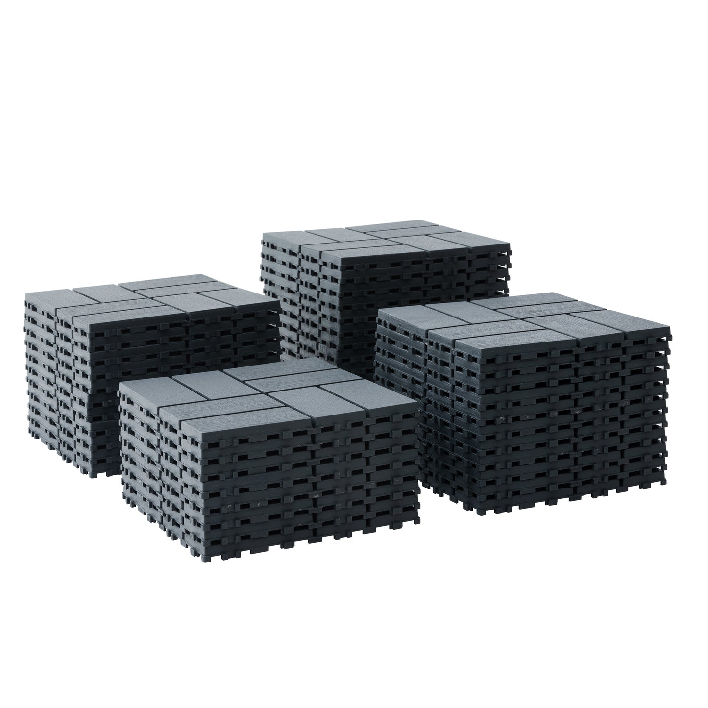 Dark grey interlocking patio tiles stacked for storage offering durable outdoor flooring solutions
