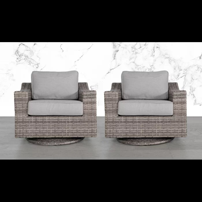 Pair of grey wicker swivel patio chairs with plush cushions