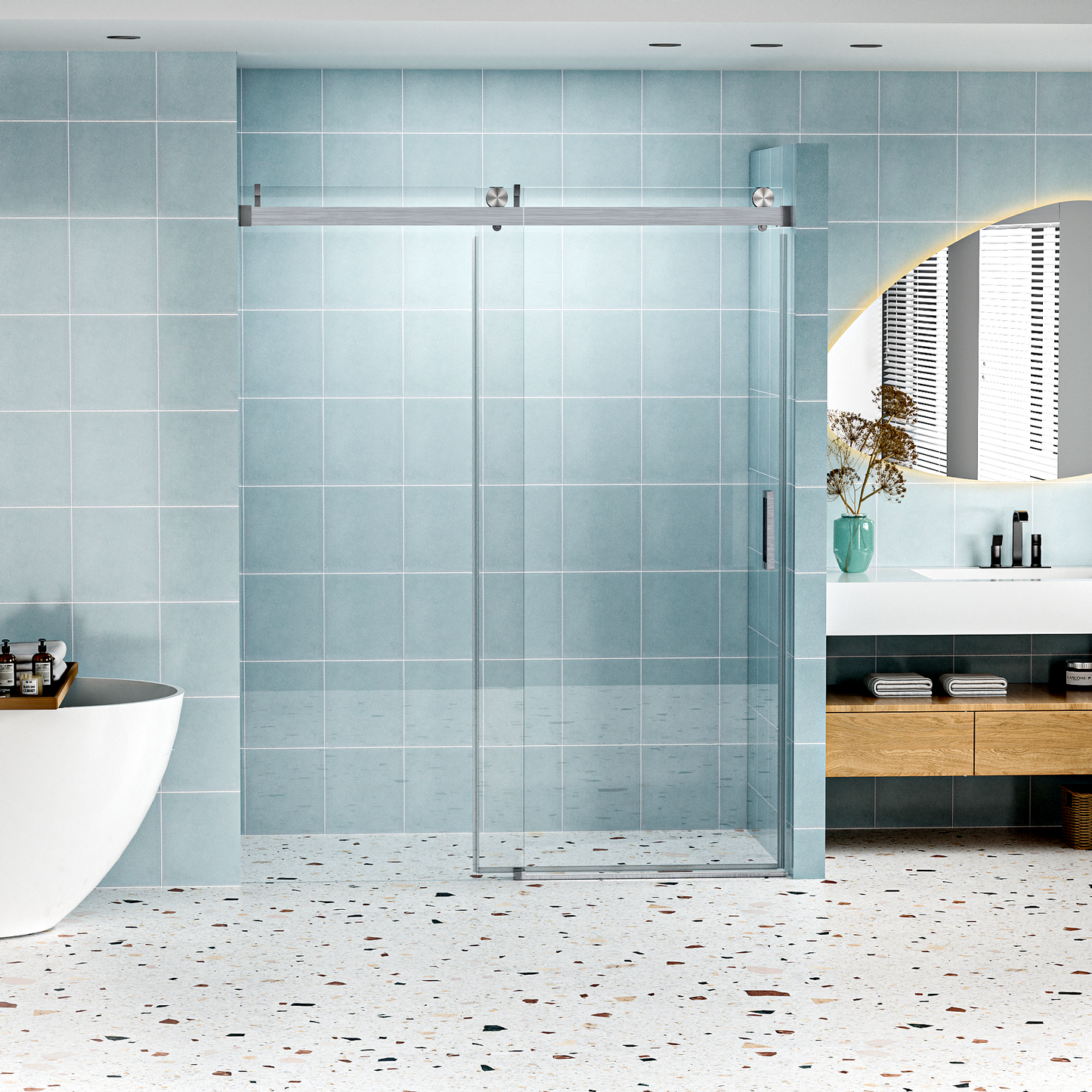 Sleek glass shower enclosure with chrome sliding door and handle on blue tiled wall