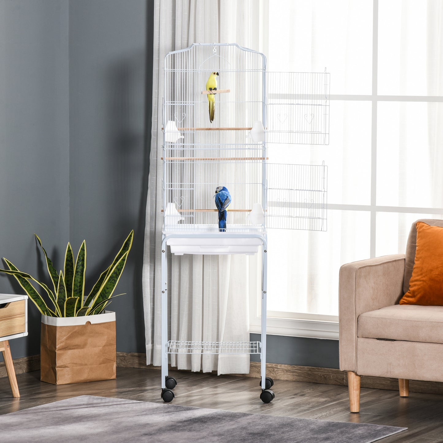 Spacious white wire bird cage with a yellow parakeet perched inside offering ample room for flight