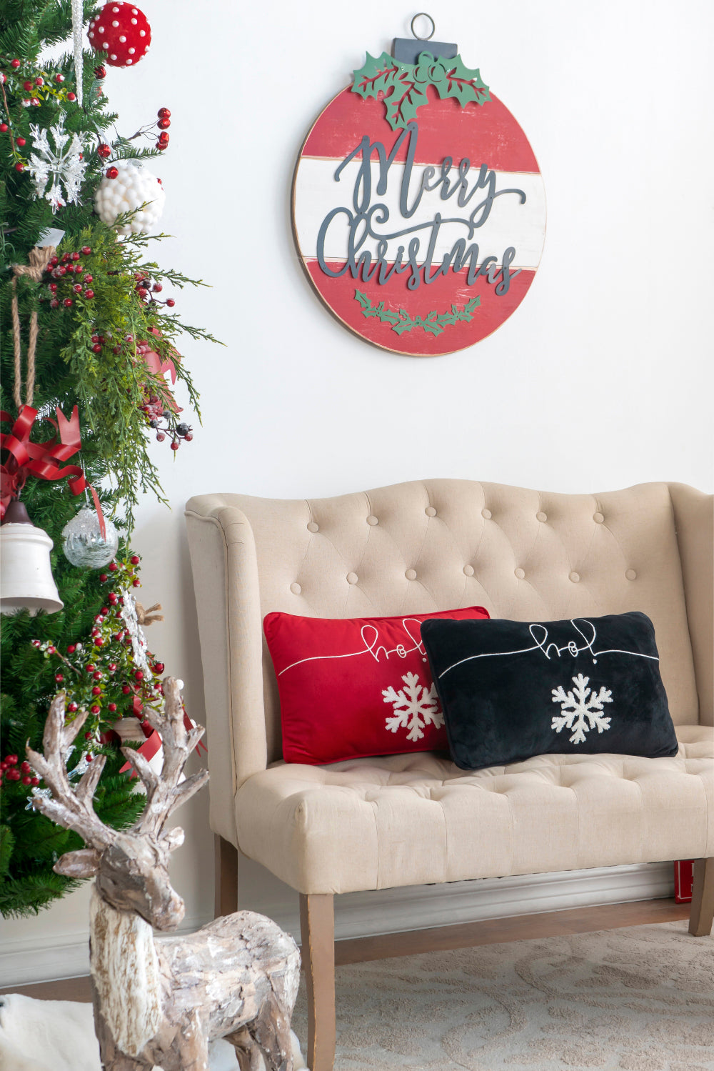 Red velvet pillow with white snowflake and joy text perfect for holiday decor
