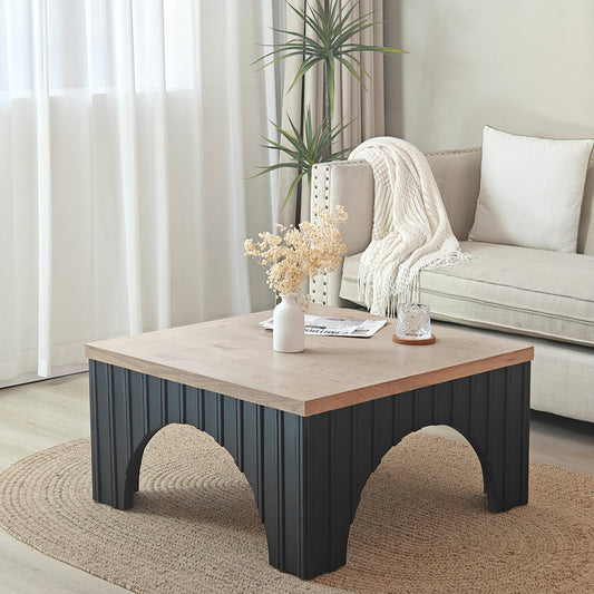 Modern rustic coffee table with light wood top and ribbed black base