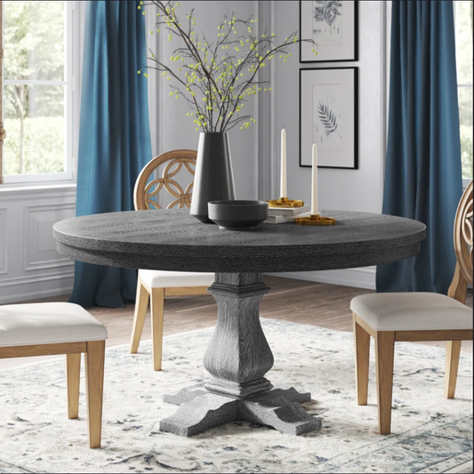 Dark gray round dining table with pedestal base suitable for modern homes