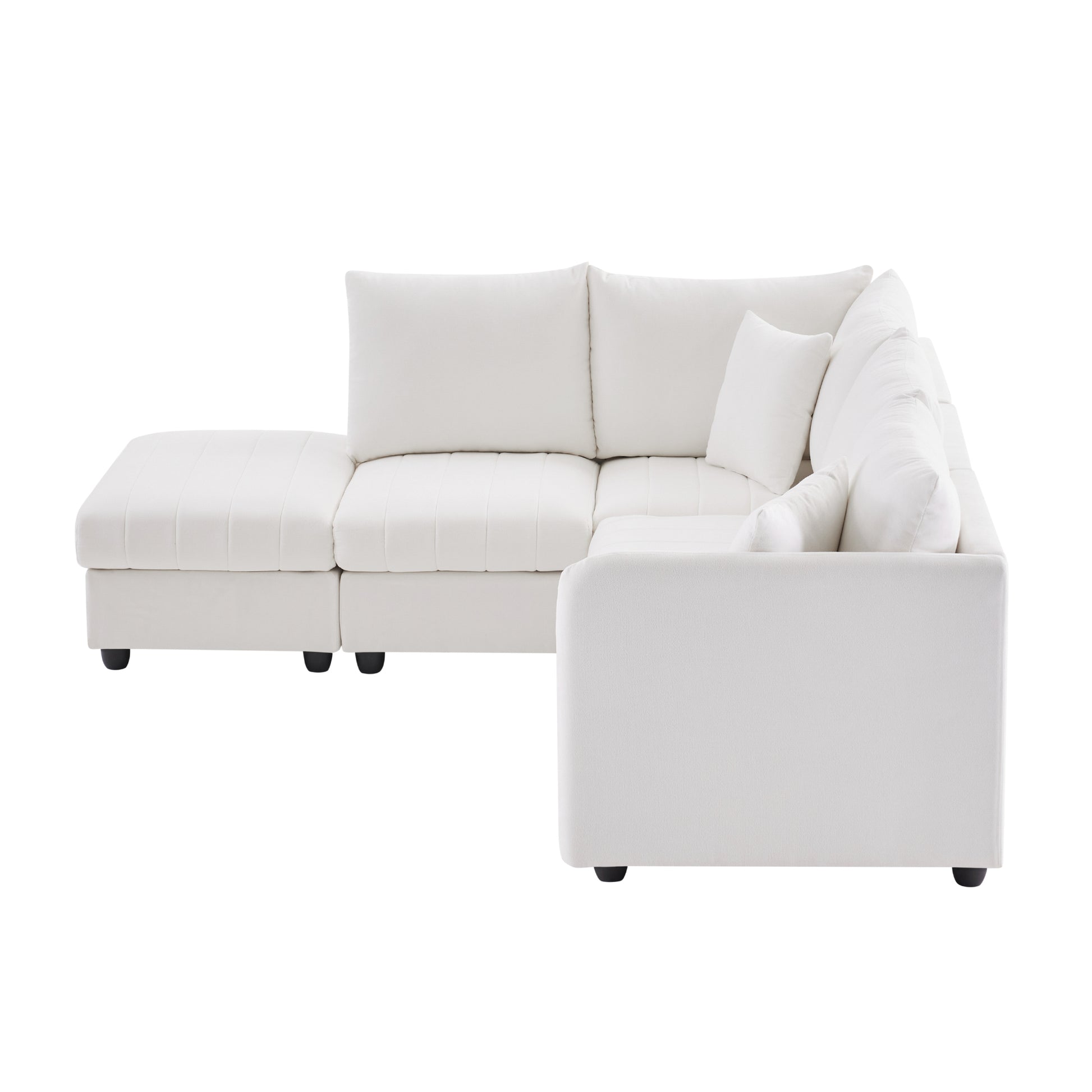 Plush white fabric sectional sofa with deep seating and tufted chaise