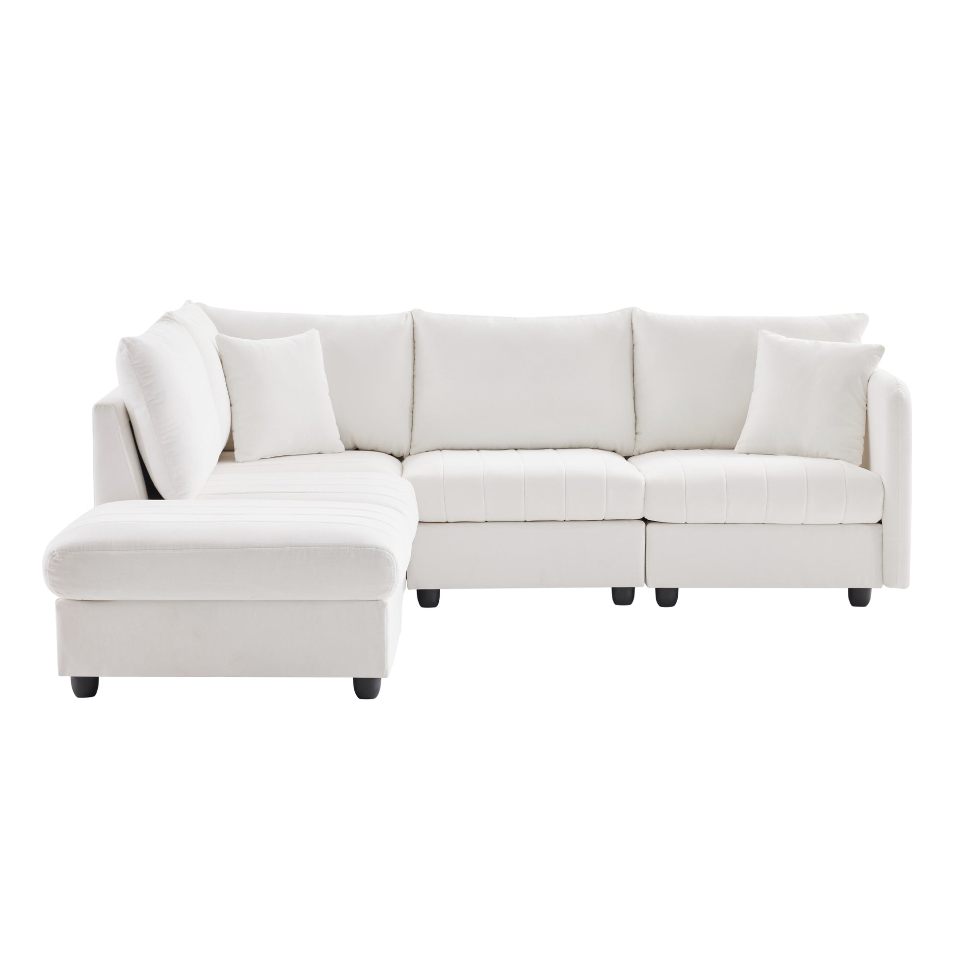 Plush white sectional sofa with chaise lounge and matching throw pillows for comfortable living room seating