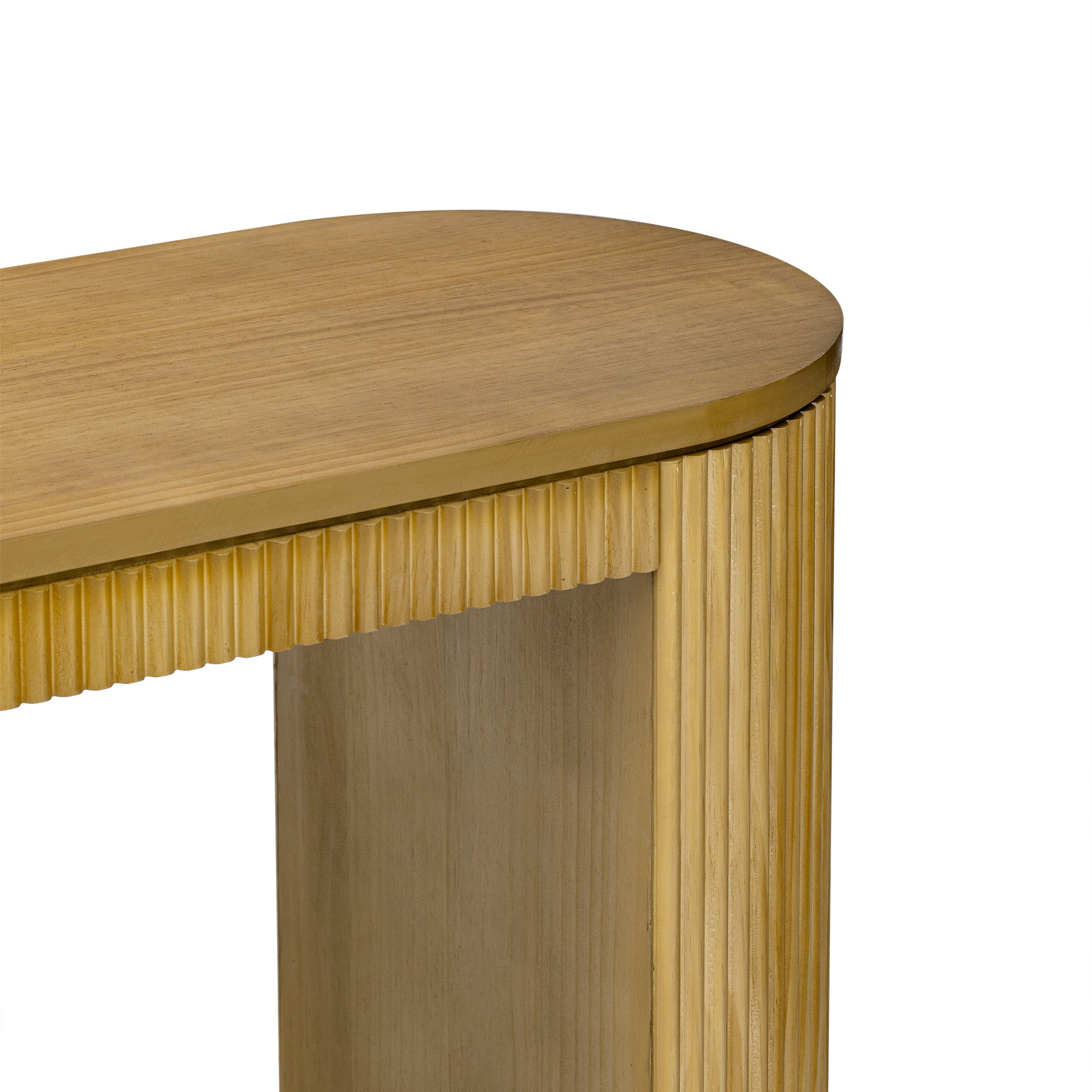 Close up of a rounded wood entryway table with fluted sides