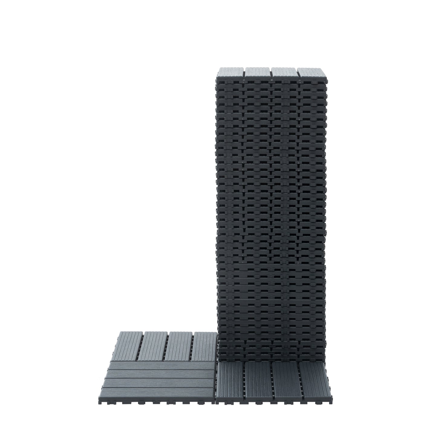 Stack of dark gray composite deck tiles with interlocking edges for easy installation