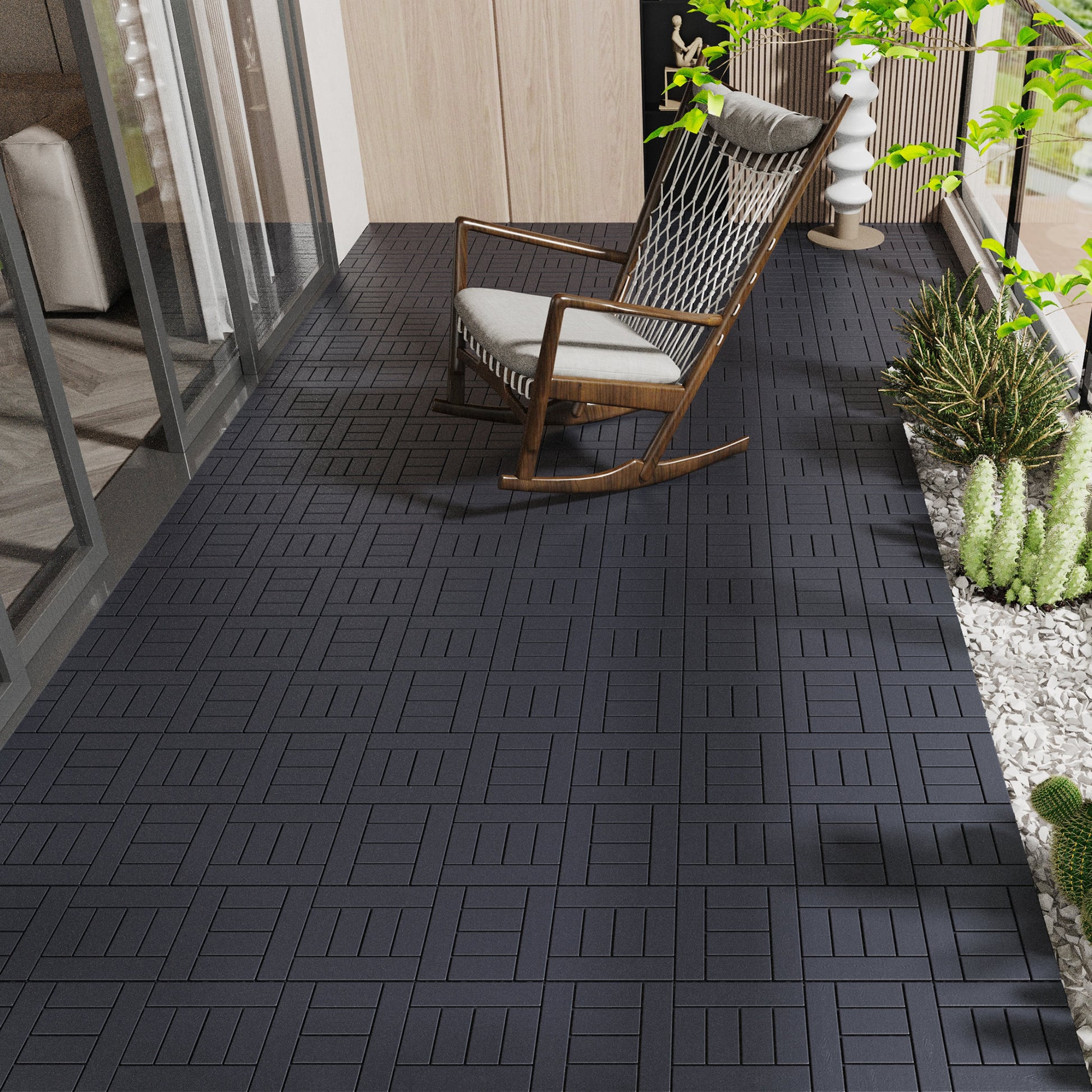 Dark grey interlocking deck tiles with a subtle wood grain texture ideal for outdoor patios