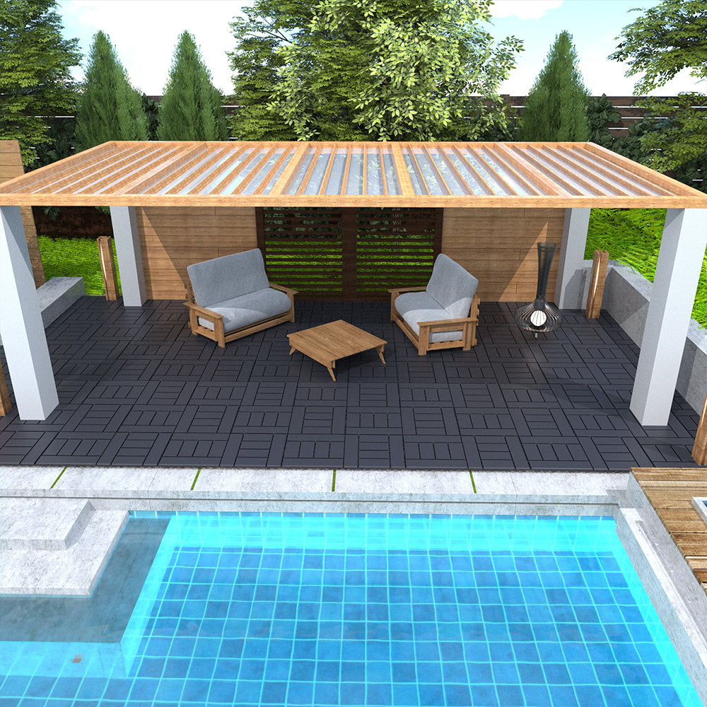 Modern patio furniture set with gray cushions and wood frames next to a pool