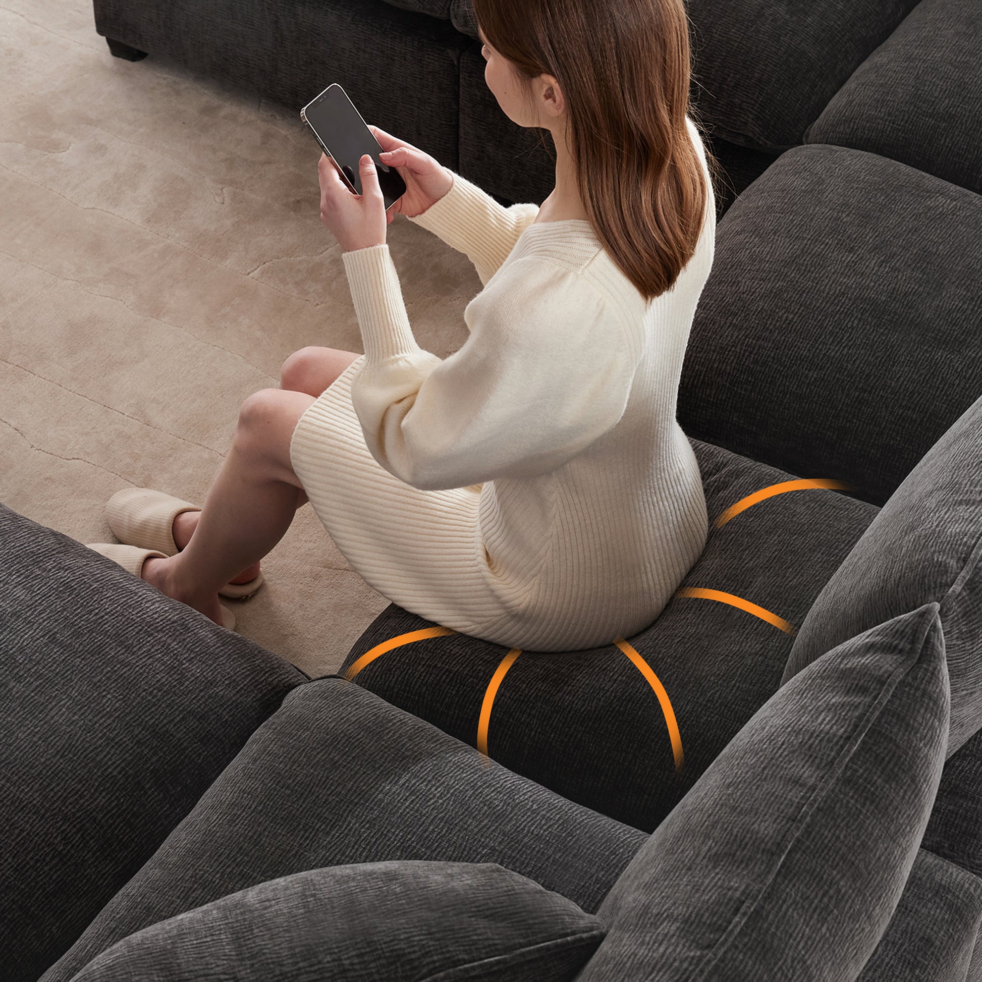 Woman using ergonomic seat cushion for comfortable sitting on sofa