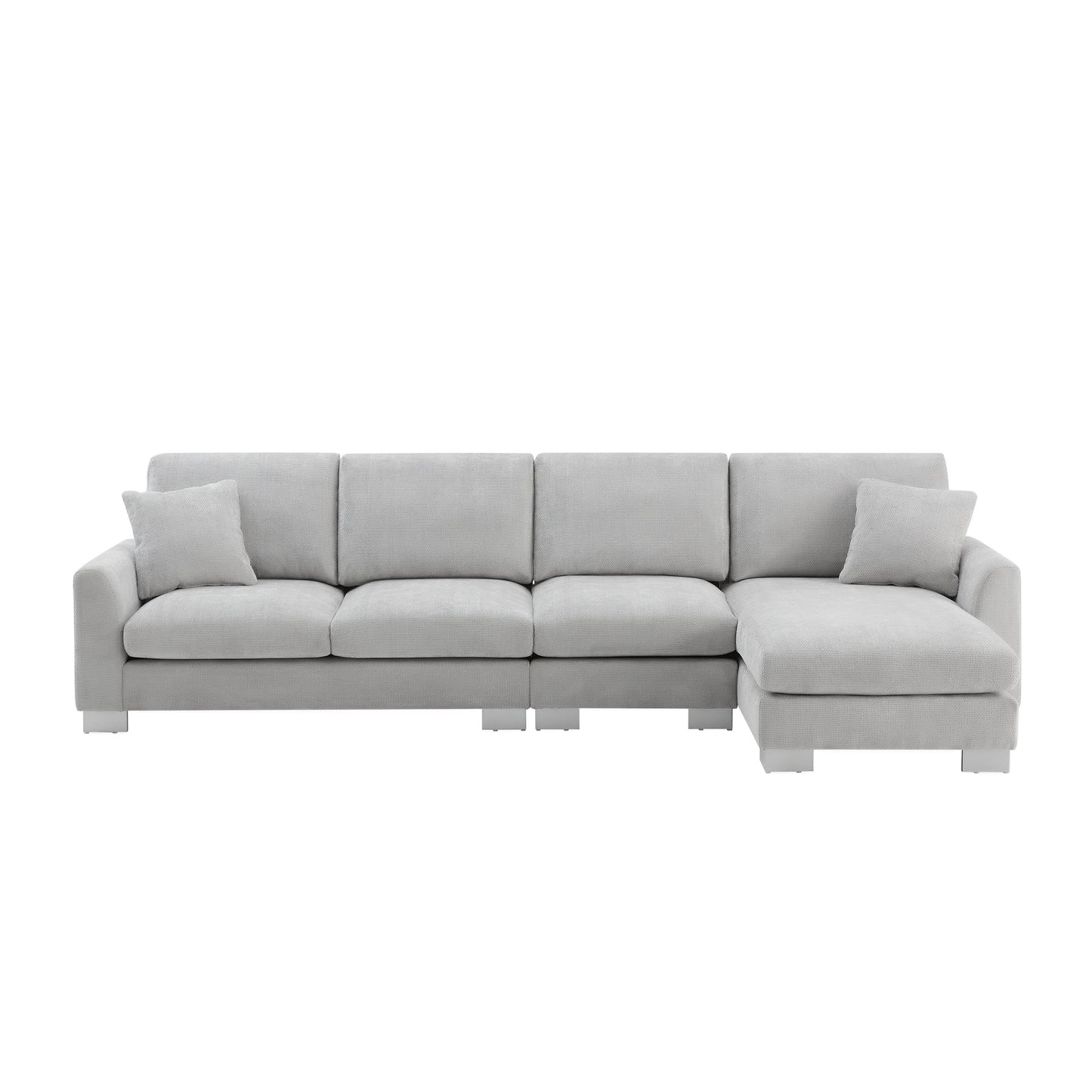 Light grey fabric sectional sofa with chaise lounge and two accent pillows