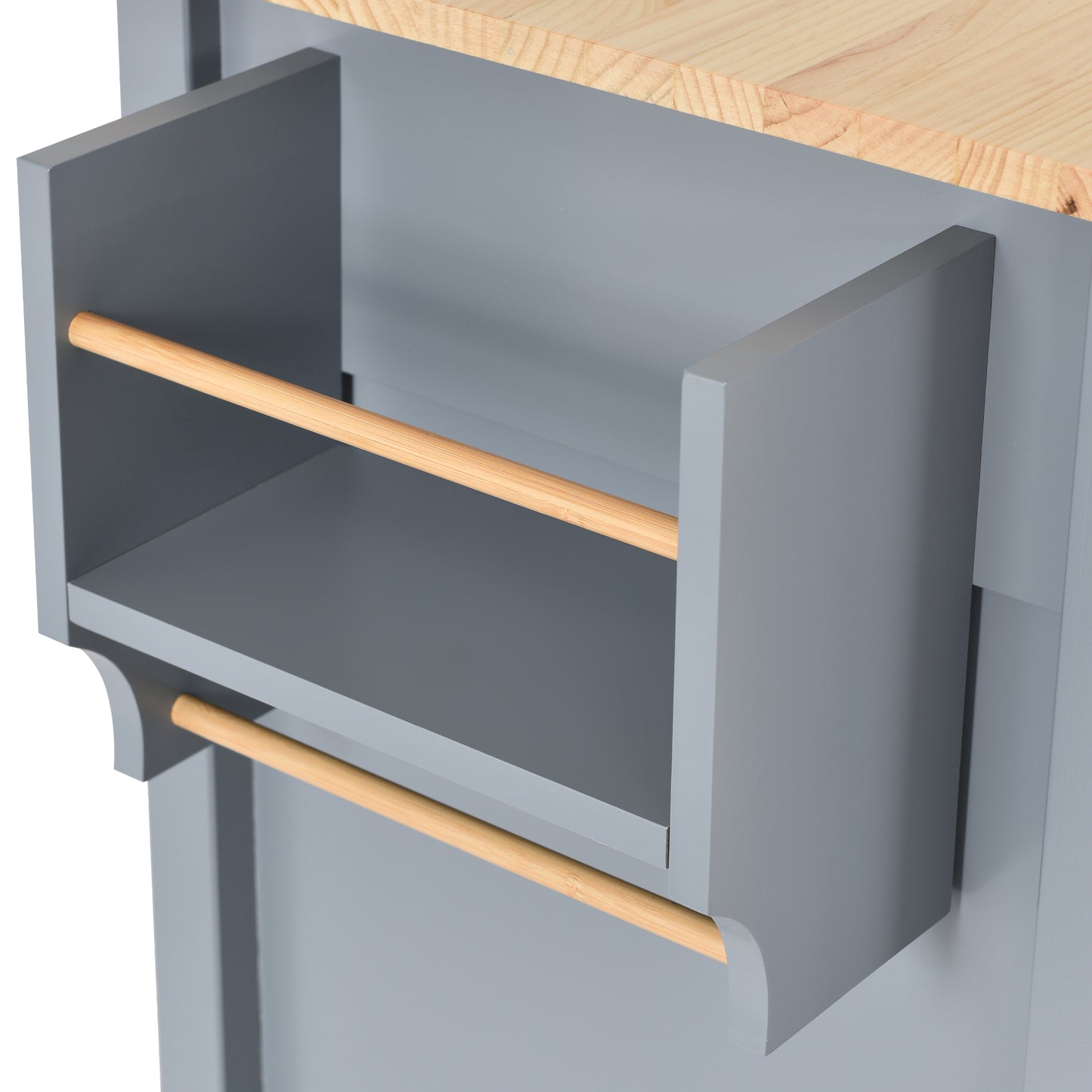 Gray kitchen island with wooden dowels for towel storage