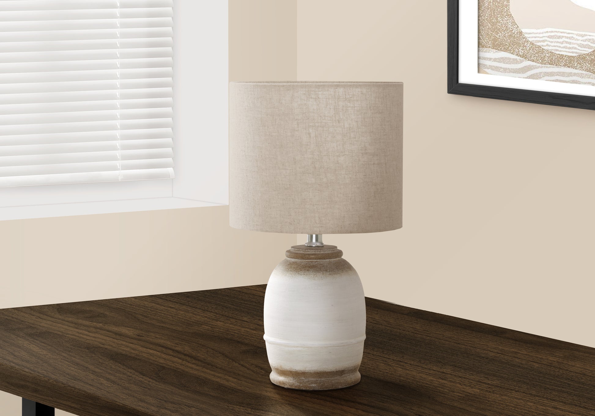 Rustic ceramic table lamp with a linen drum shade and weathered white finish for cozy room decor