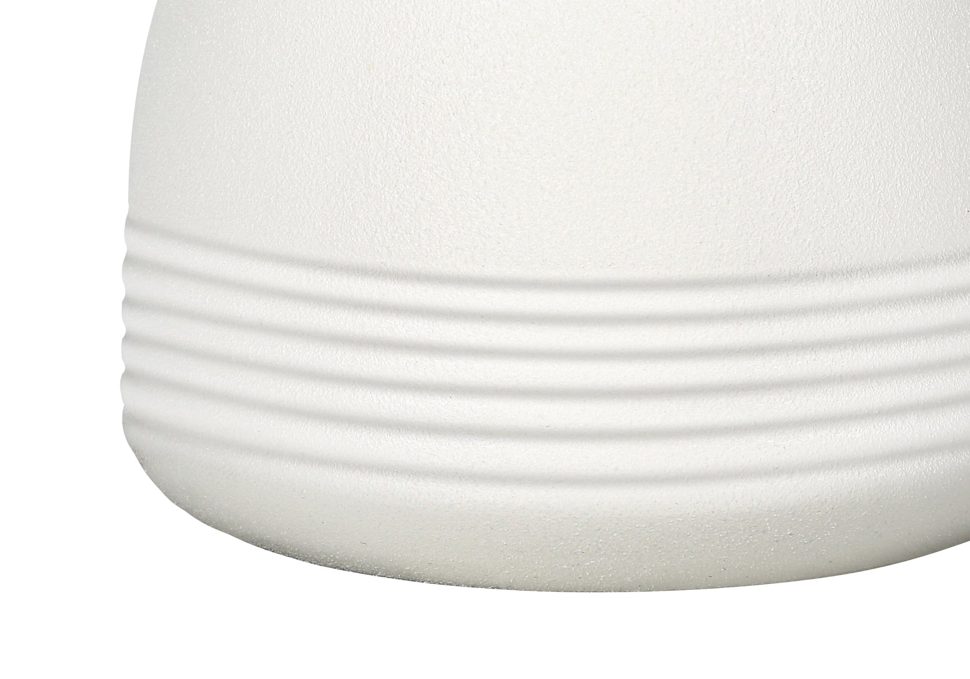 Textured white ceramic vase with subtle horizontal ribbed detailing near the base