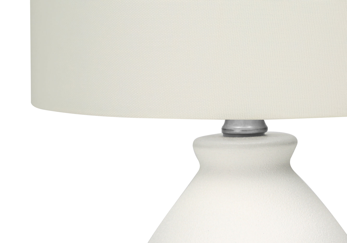 White textured ceramic table lamp with a cream fabric shade