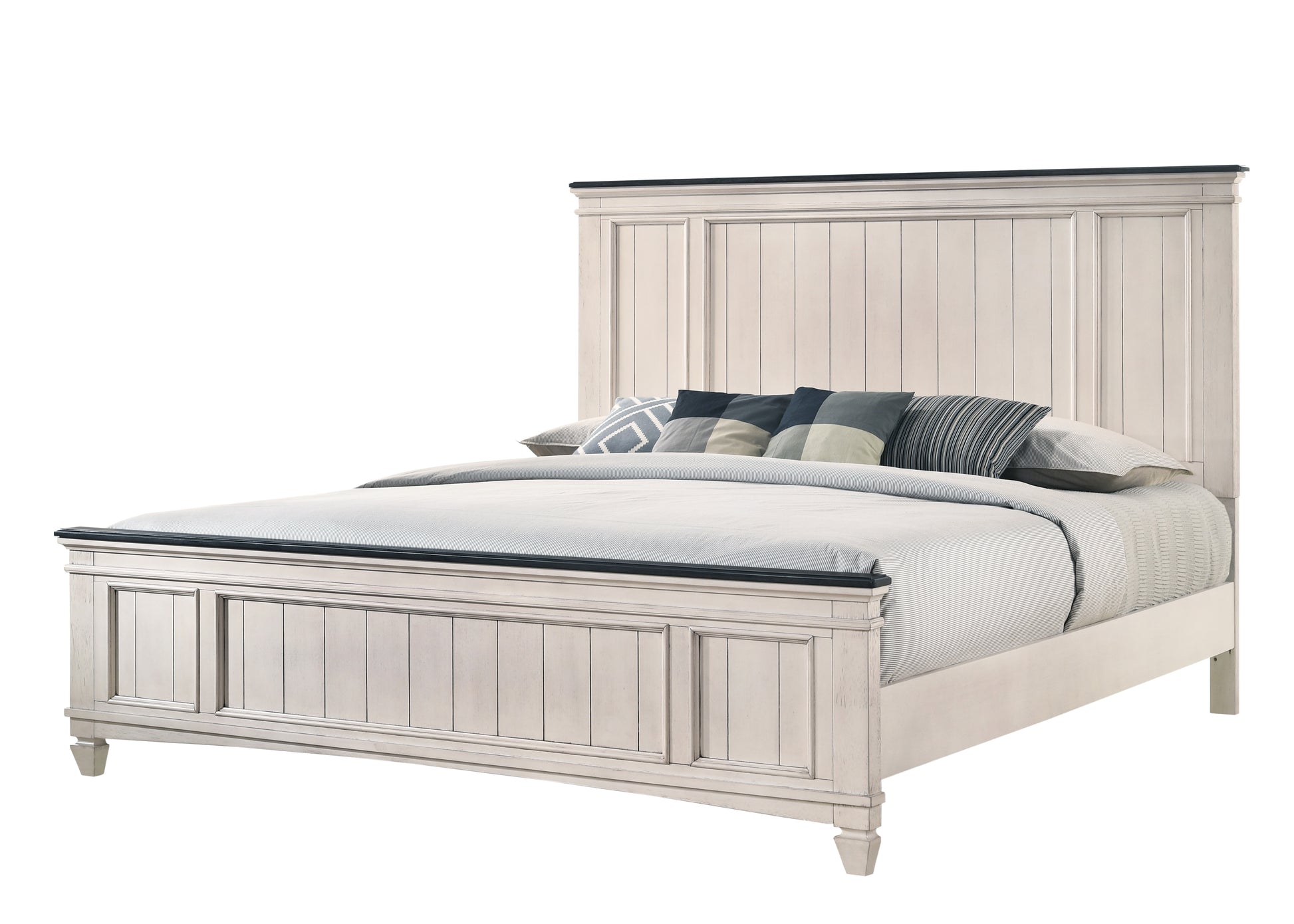 White wood panelled king size bed frame with dark accent trim and decorative pillows