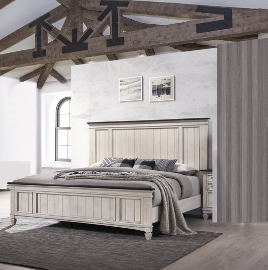 Distressed white wood king bed frame with paneled headboard and dark wood trim