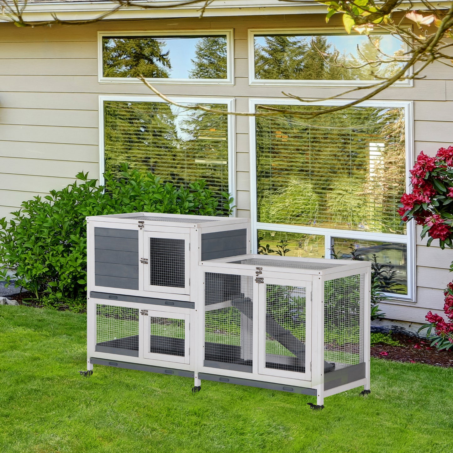 Twotier outdoor rabbit hutch with grey and white finish providing ample space for pets