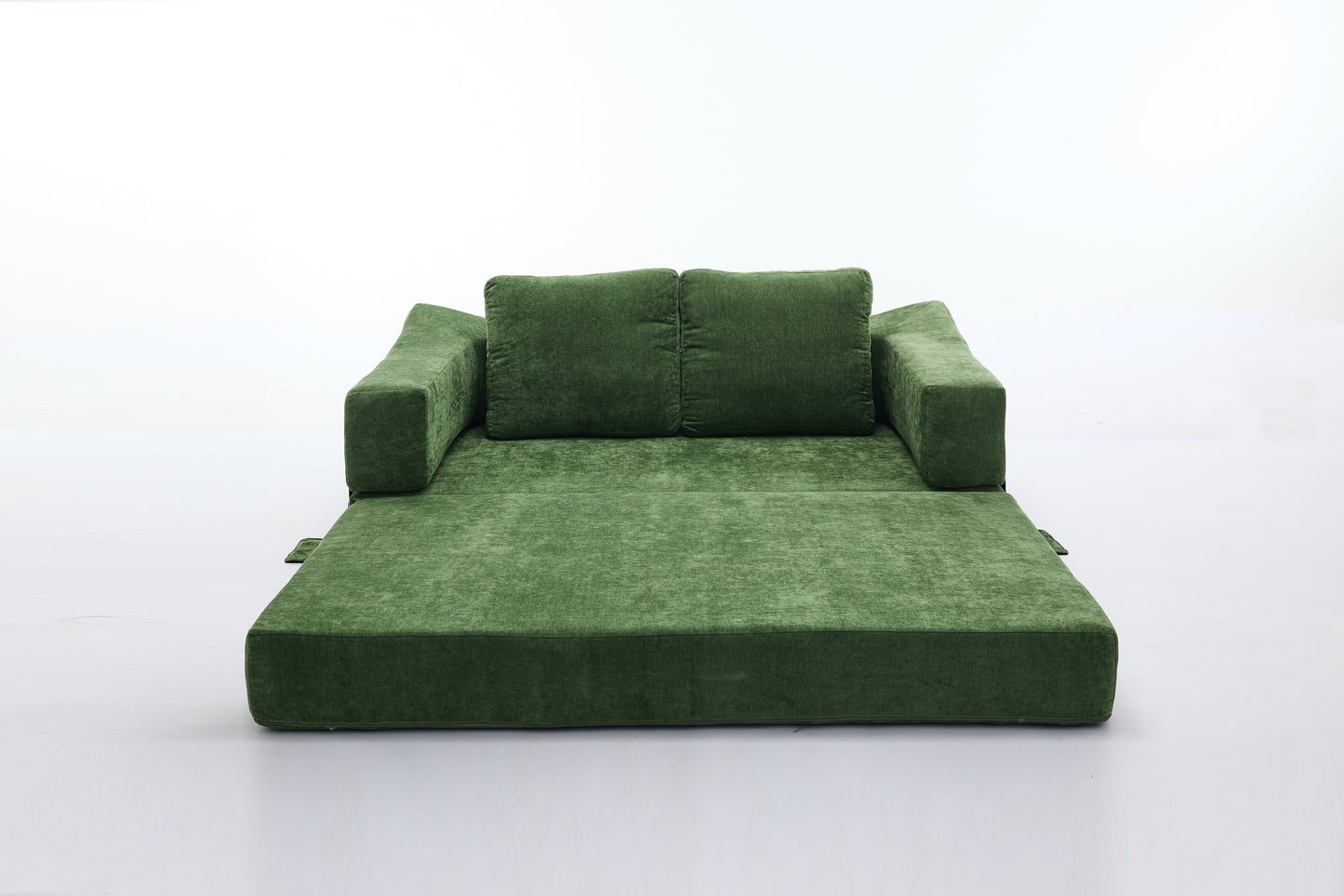 Green velvet sofa bed with two plush back cushions perfect for small spaces