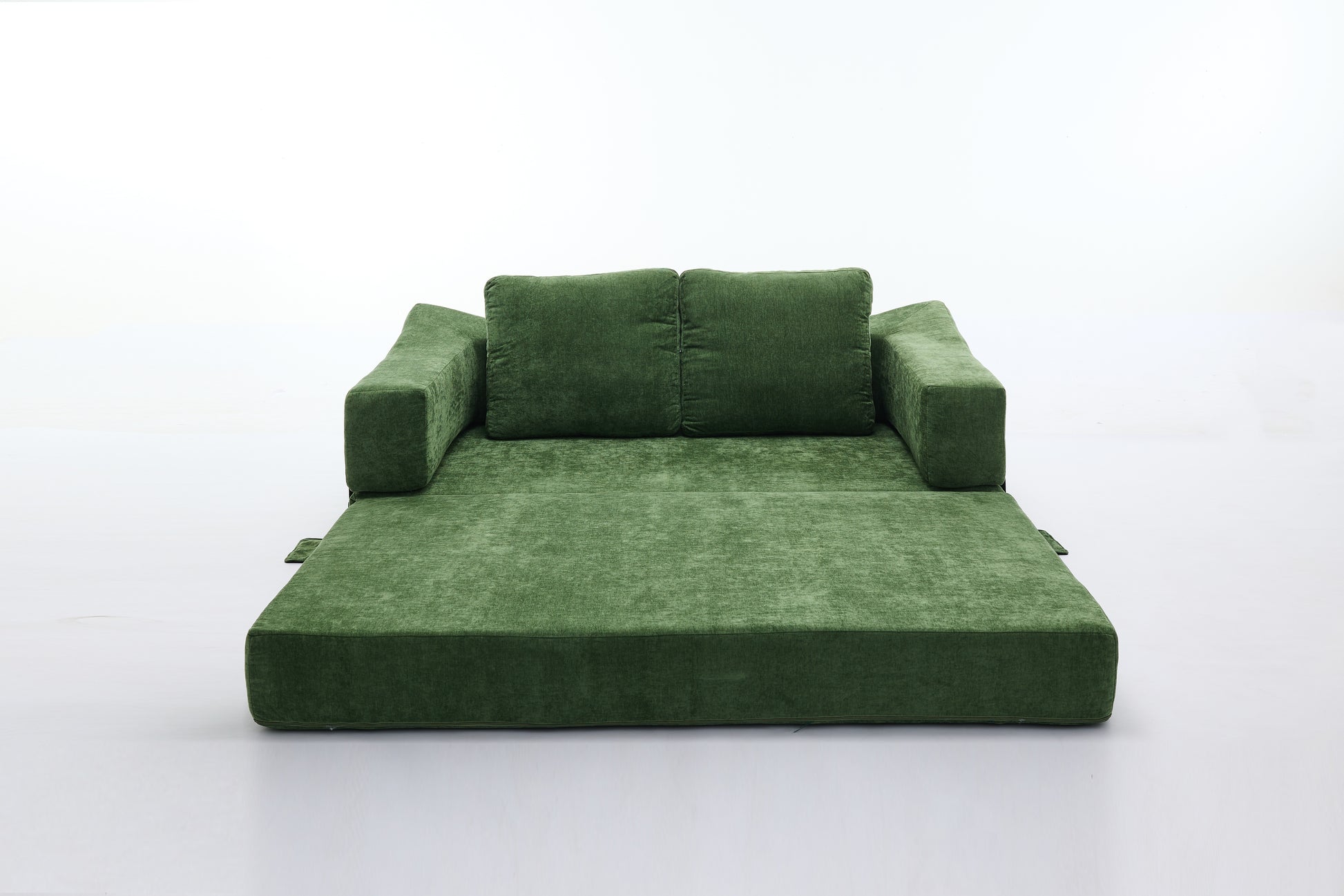 Green velvet sofa bed with two plush back cushions perfect for small spaces