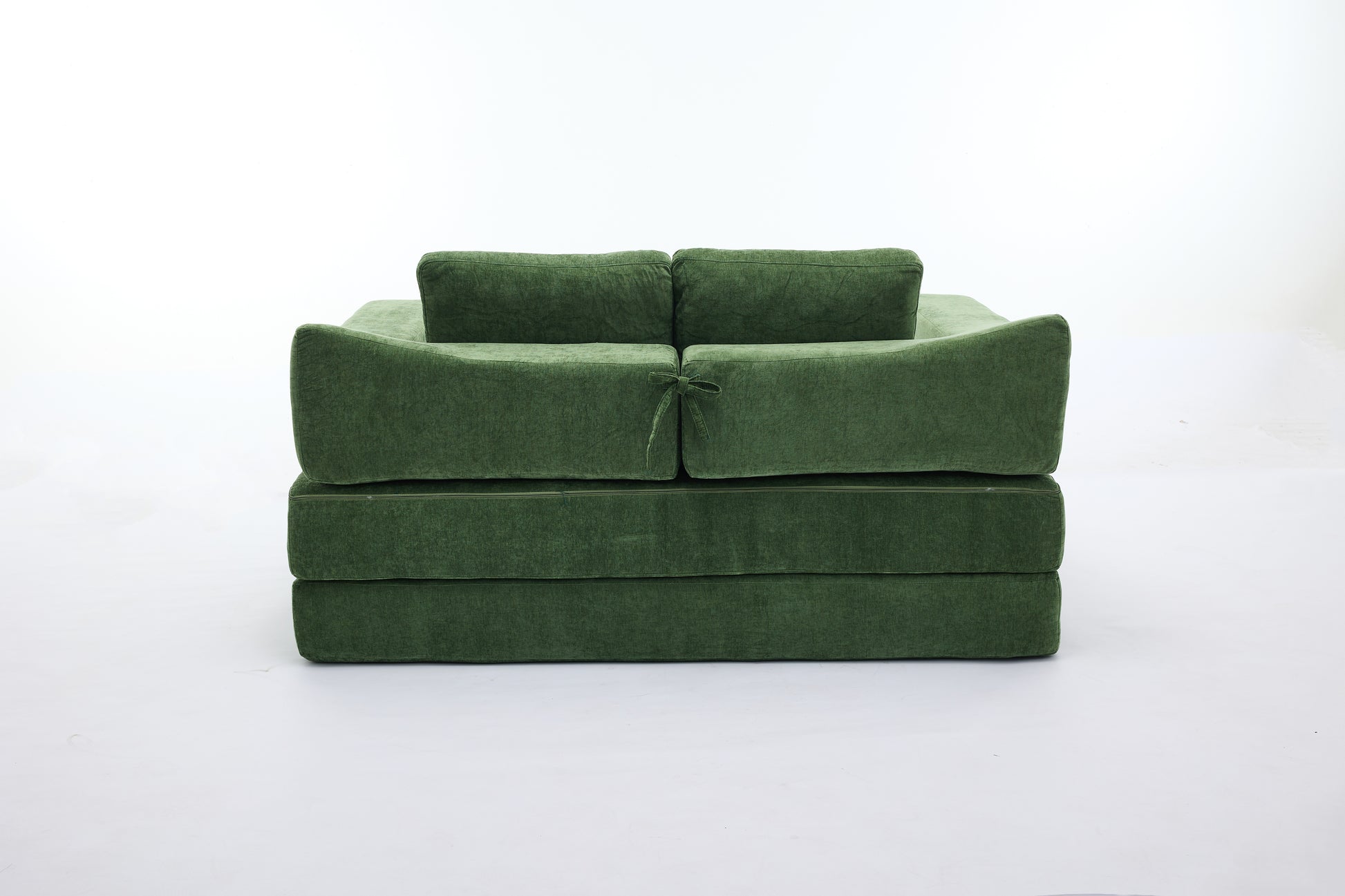 Emerald green modular sofa with plush velvet upholstery and clean lines perfect for modern living rooms