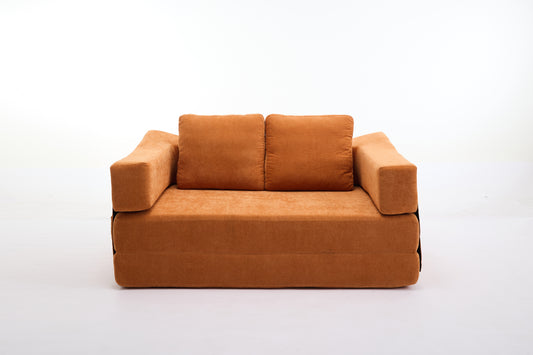 Comfortable orange sofa bed with plush cushions perfect for small apartments