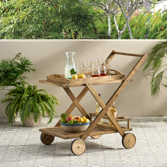 Wooden bar cart with fruit bowl and drinks