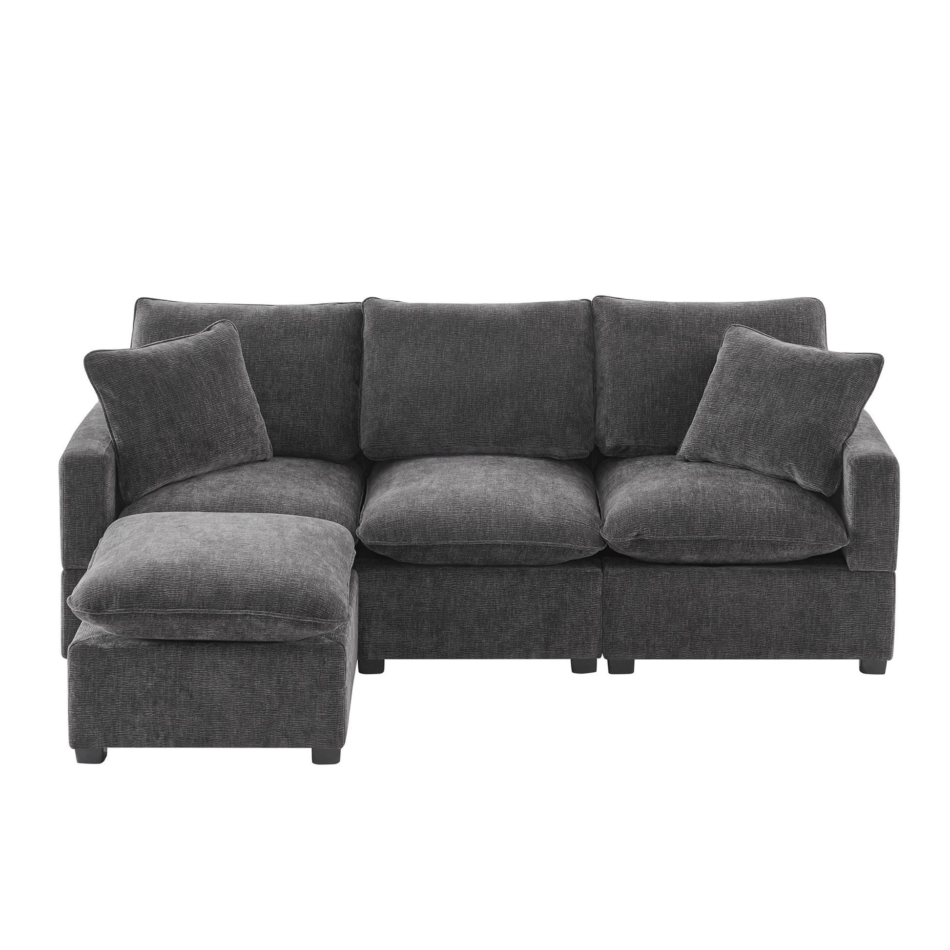 Dark gray fabric sectional sofa with plush cushions and an ottoman for modern living rooms